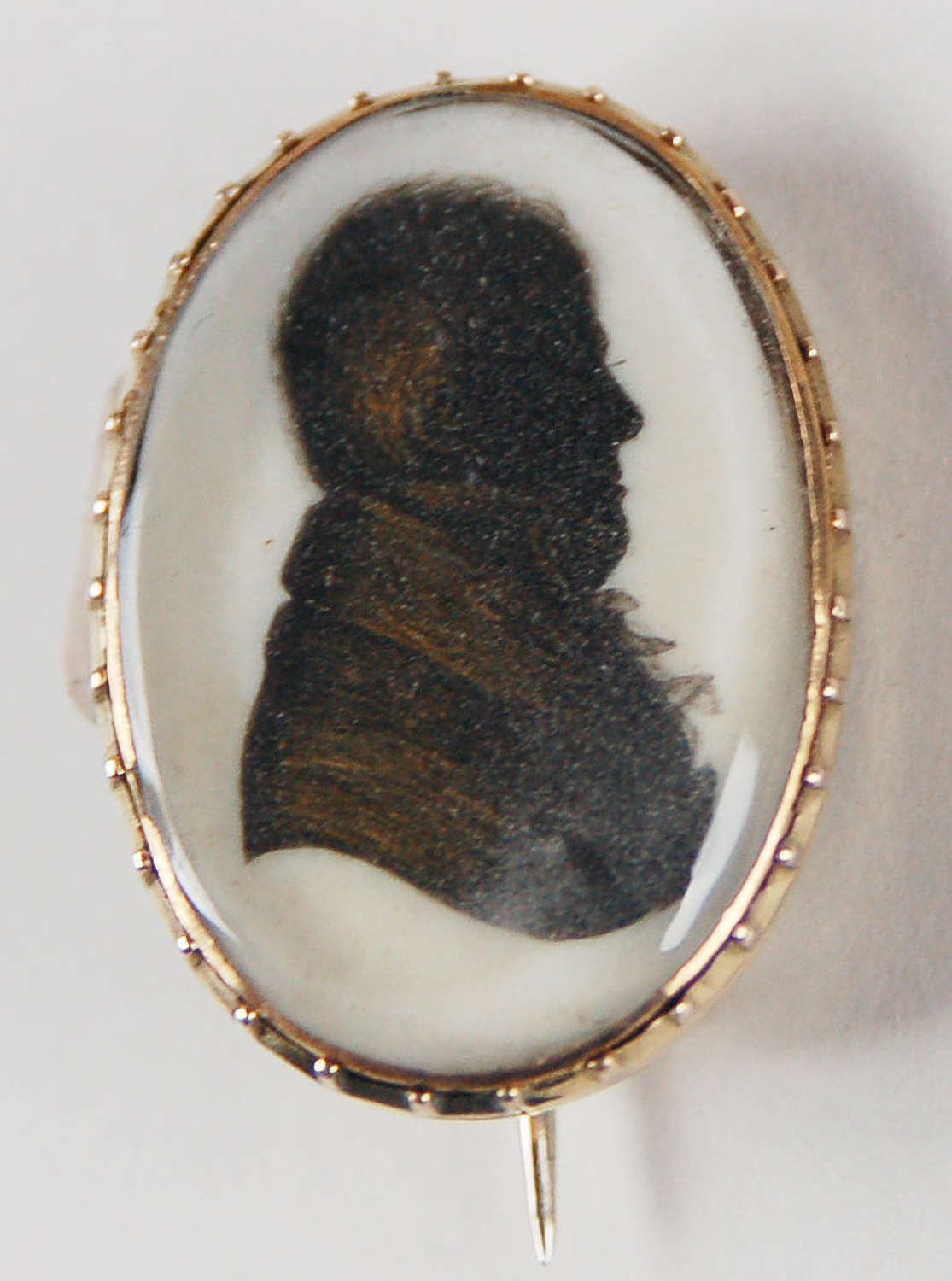Silhouette attributed to Miers C1800 in gold brooch setting